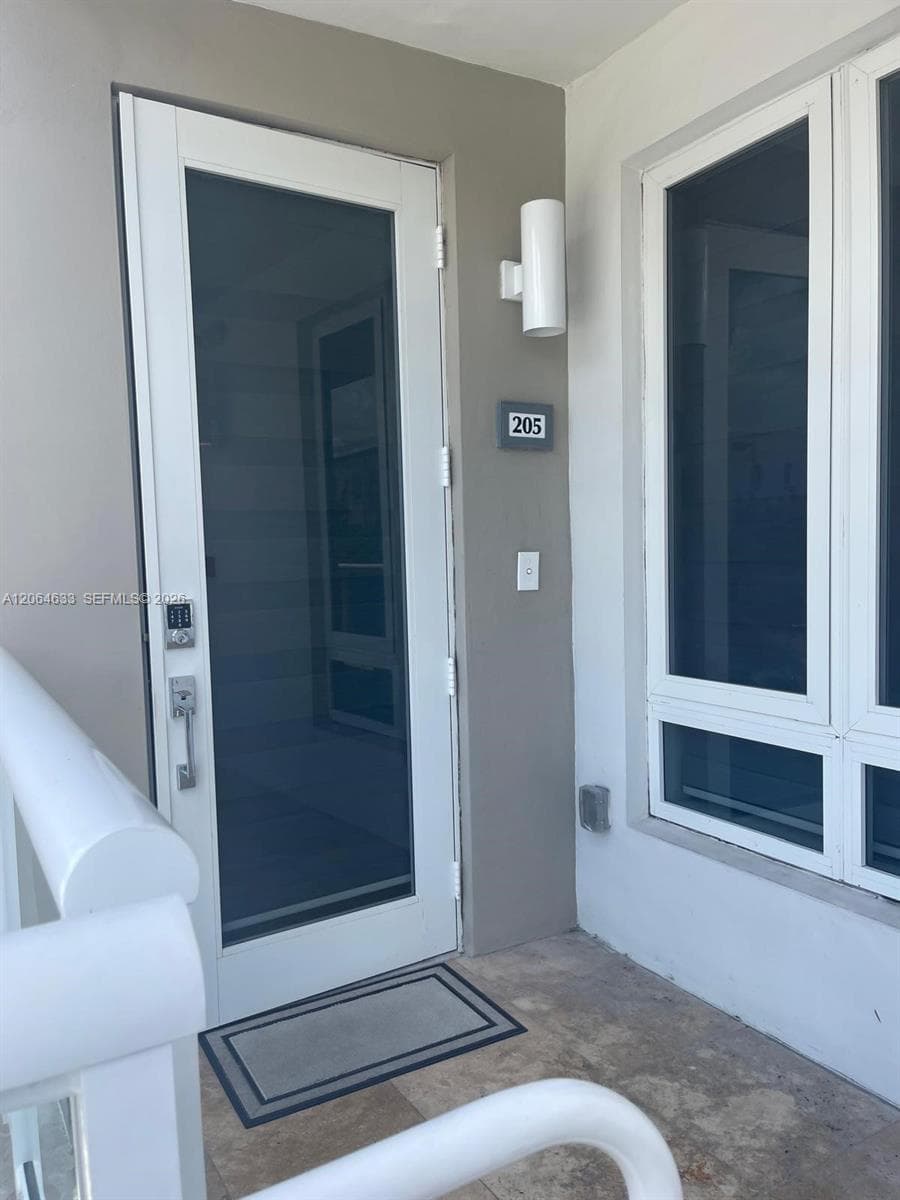 Condominium at 10220 NW 63rd Ter # 205, Doral FL 33178