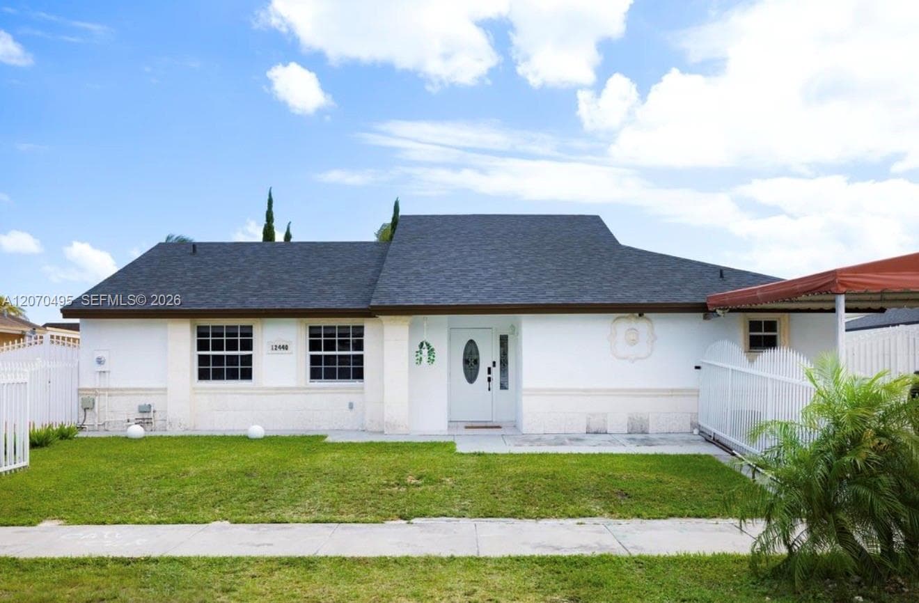 Single Family Residence at 12440 SW 207th Ter, Miami FL 33177