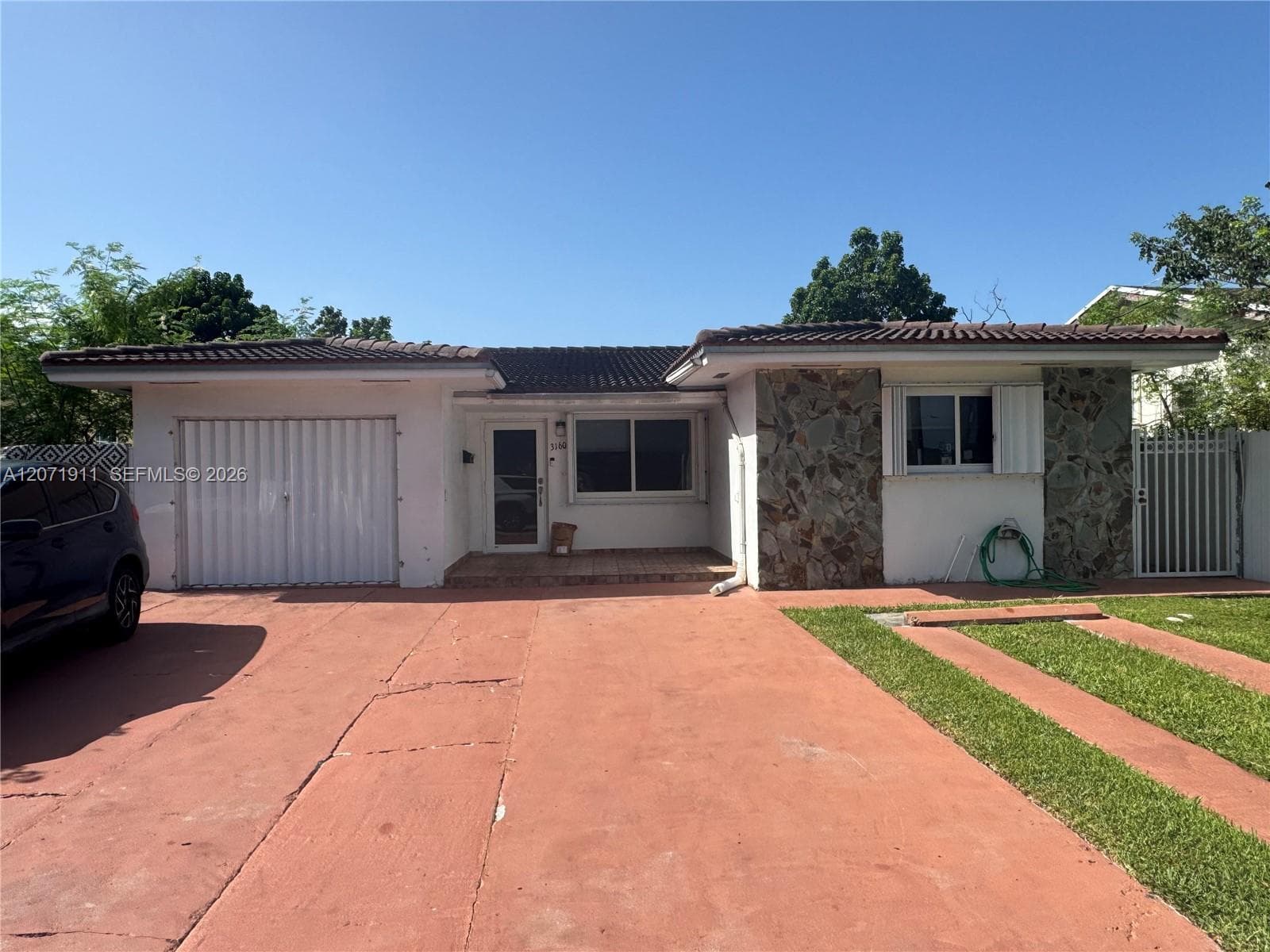 Single Family Residence at 3160 NW 3rd St, Miami FL 33125