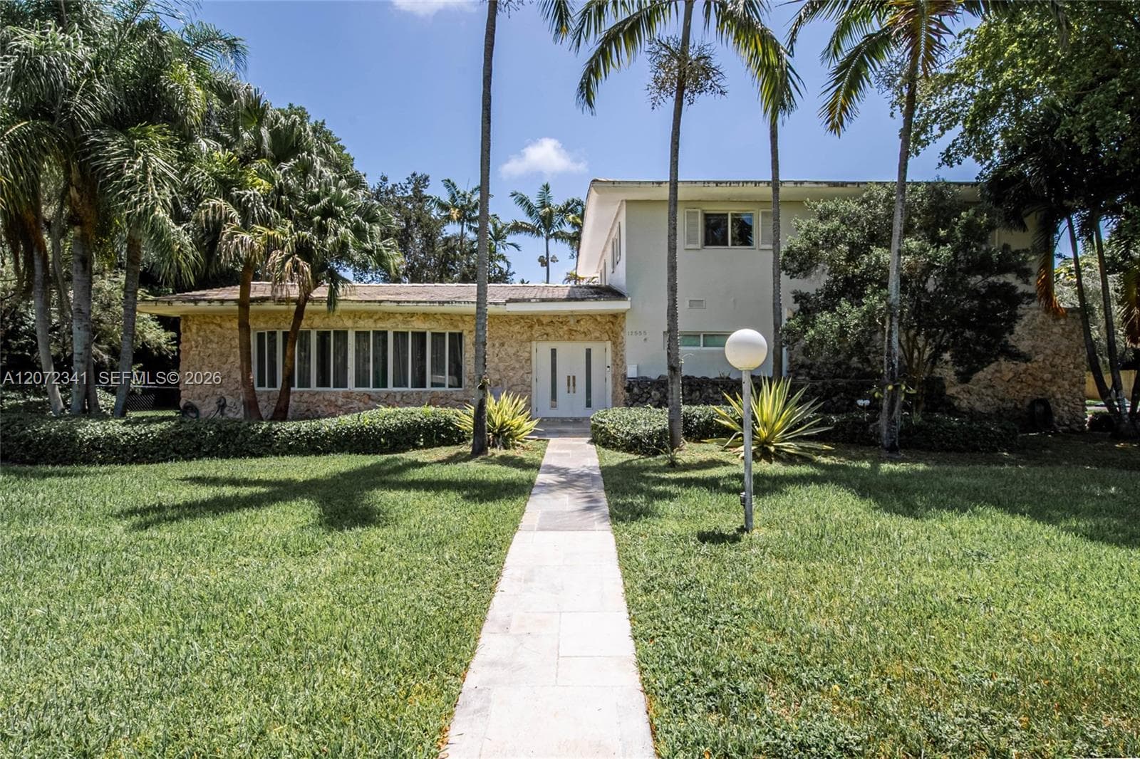 Single Family Residence at 12555 SW 69th Ct, Pinecrest FL 33156
