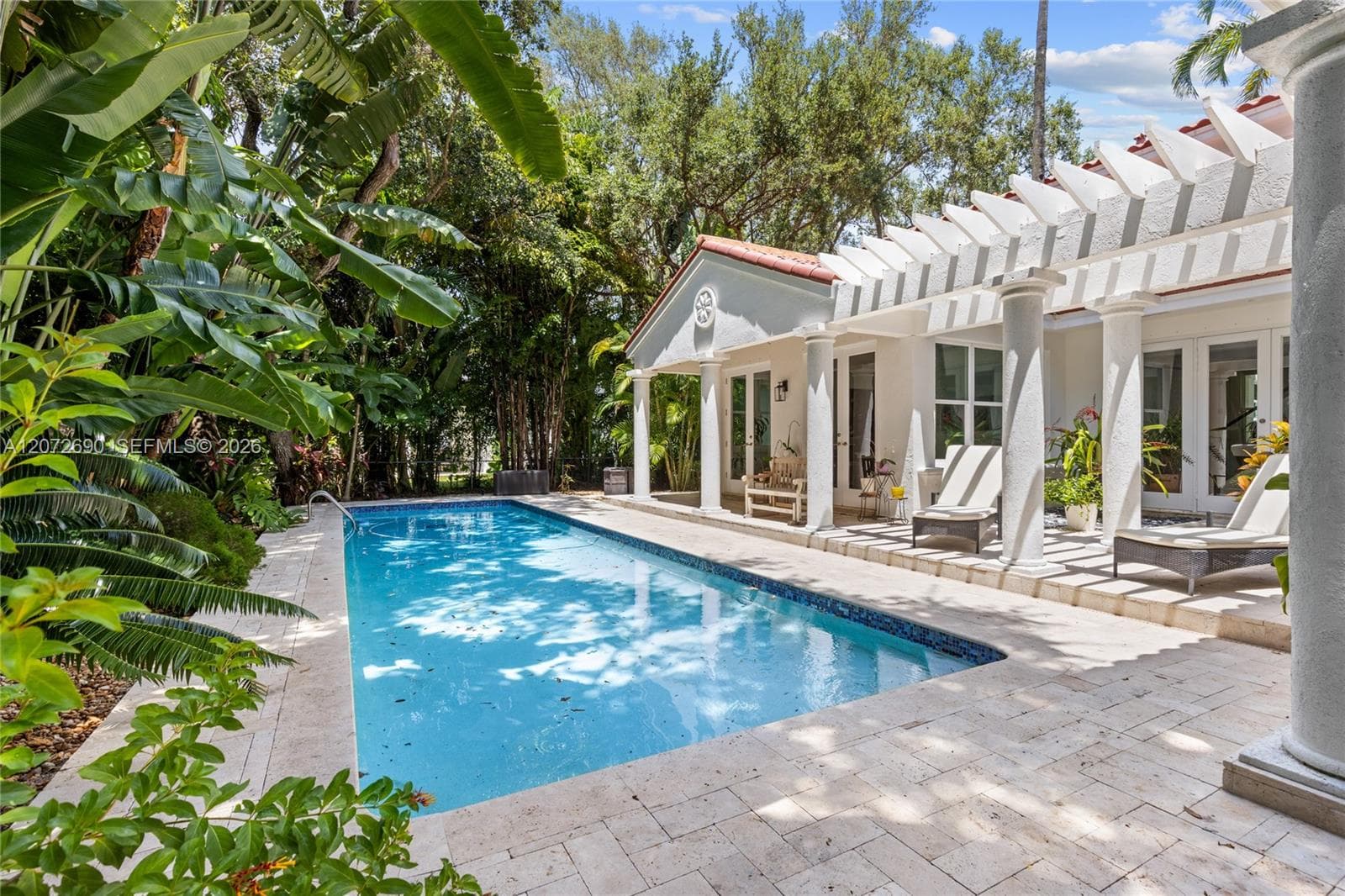 Single Family Residence at 11050 Girasol Ave, Coral Gables FL 33156