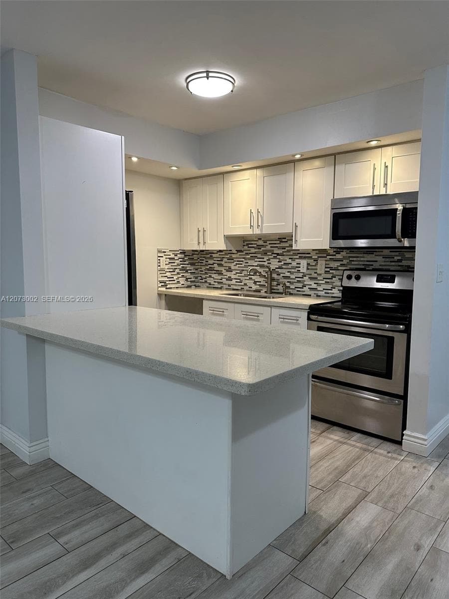 Condominium at 18875 NW 62nd Ave # 106, Hialeah FL 33015