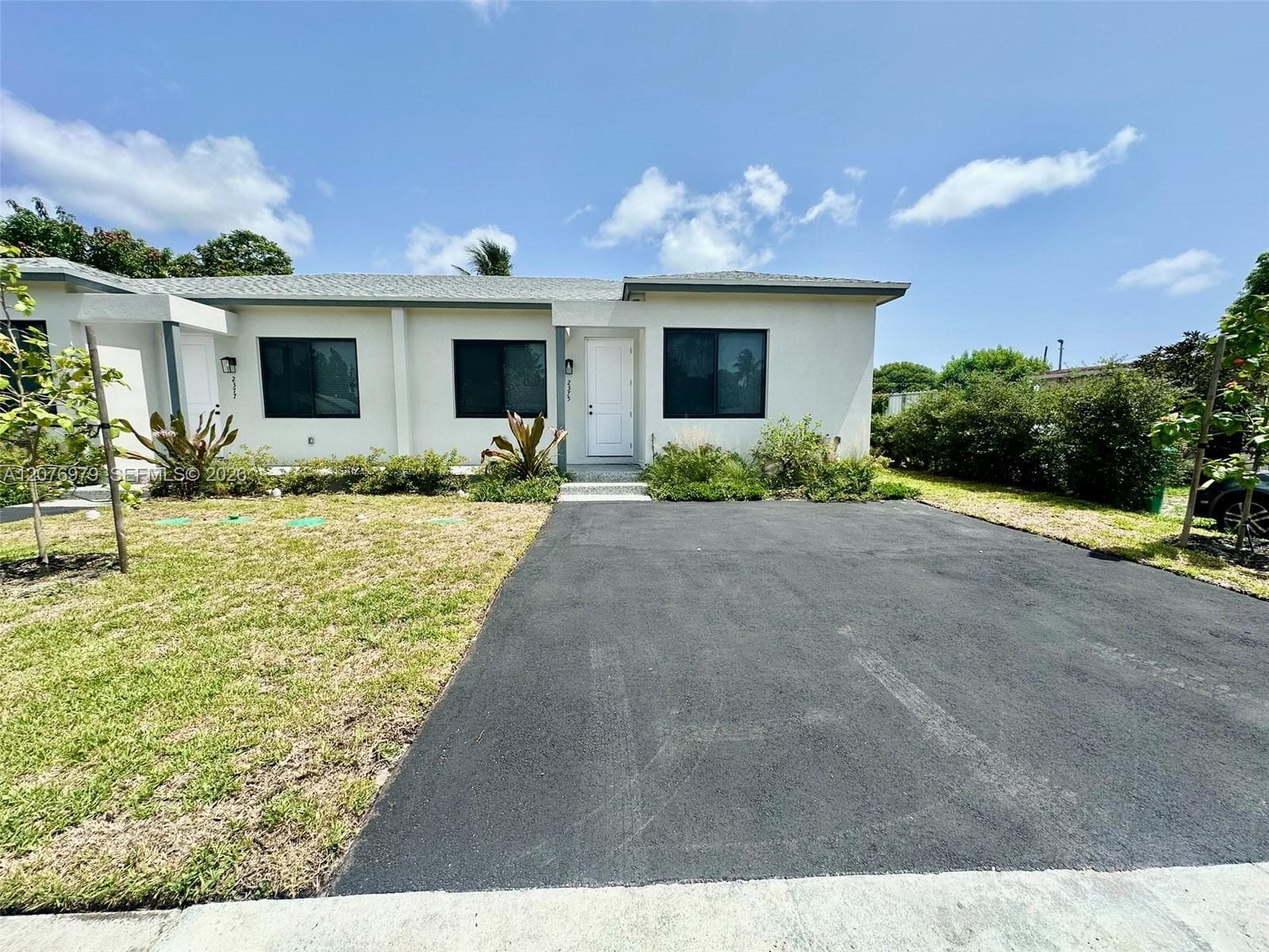 Multi Family at 2375 NW 105th St, Miami FL 33147