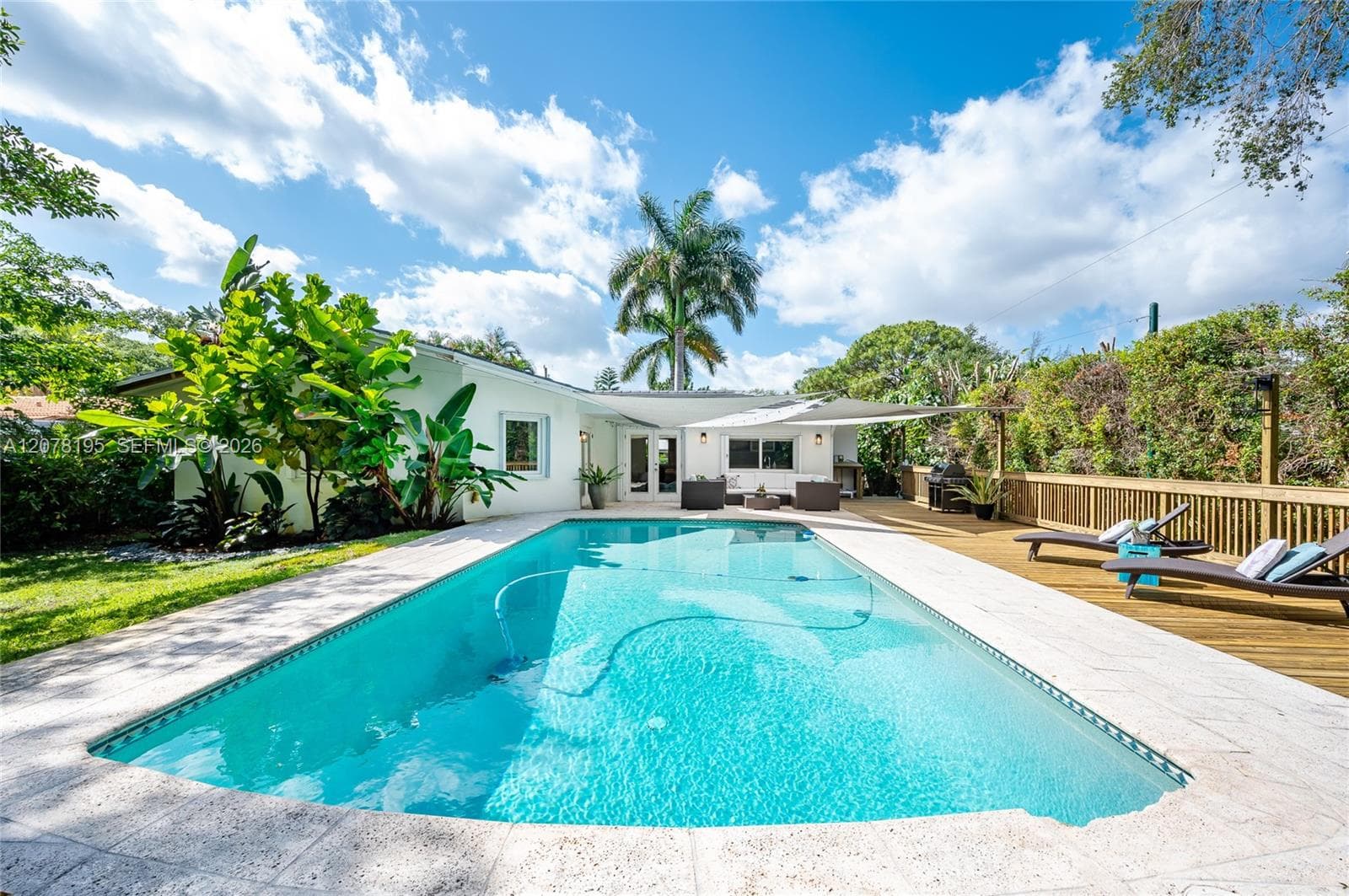 Single Family Residence at 1003 NE 118th St, Biscayne Park FL 33161