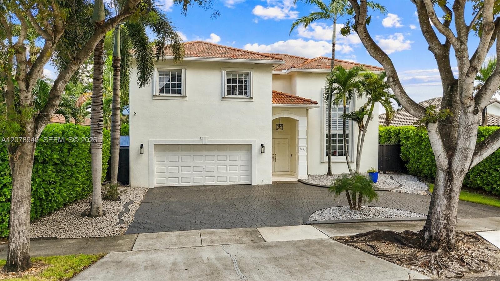 Single Family Residence at 9067 NW 169th St, Miami Lakes FL 33018