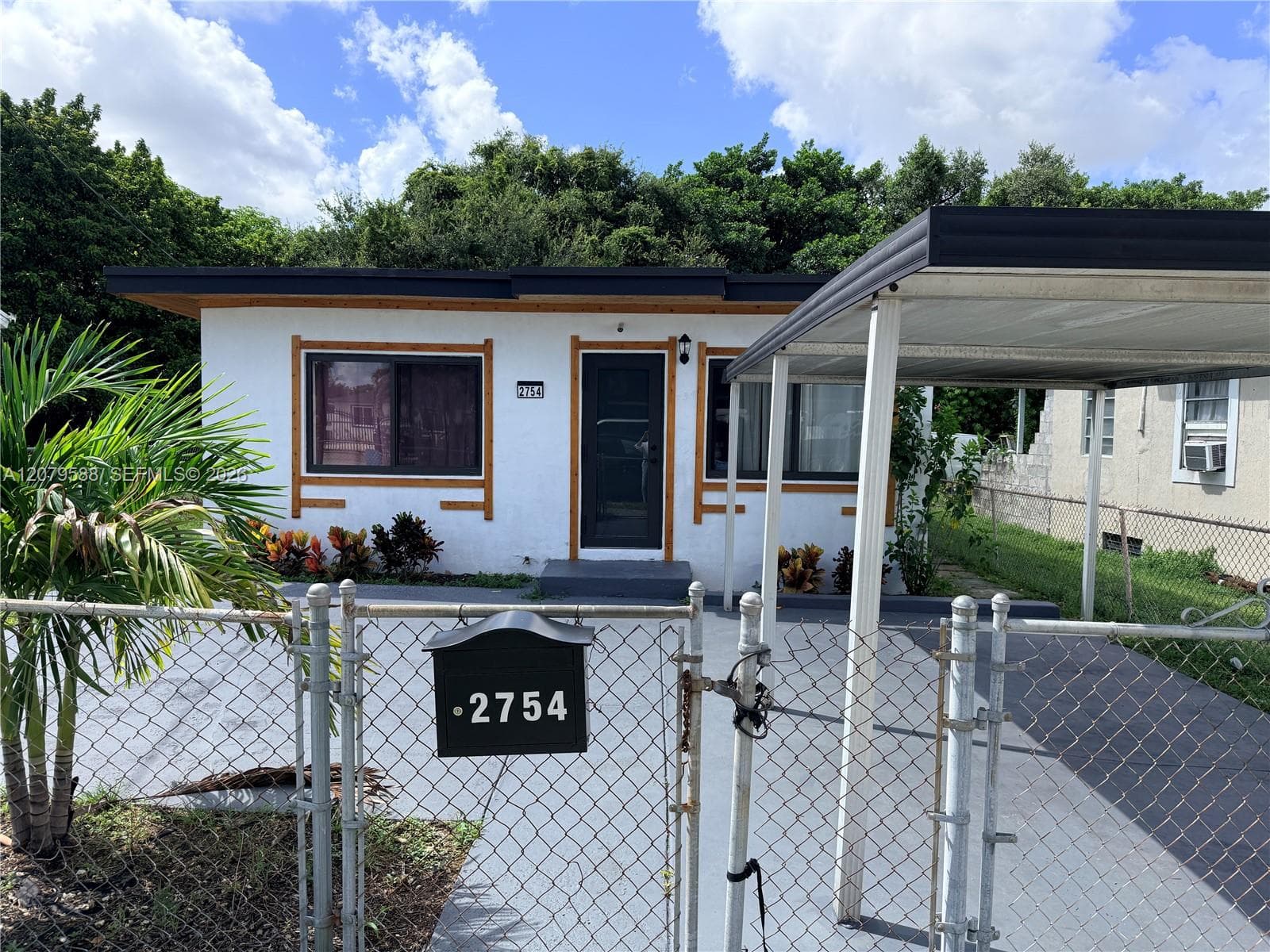 Single Family Residence at 2754 NW 60th St, Miami FL 33142
