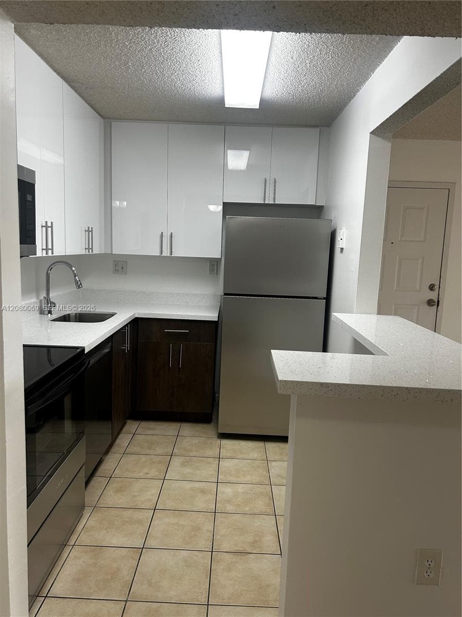 Condominium at 7180 NW 179th St # 211, Hialeah FL 33015