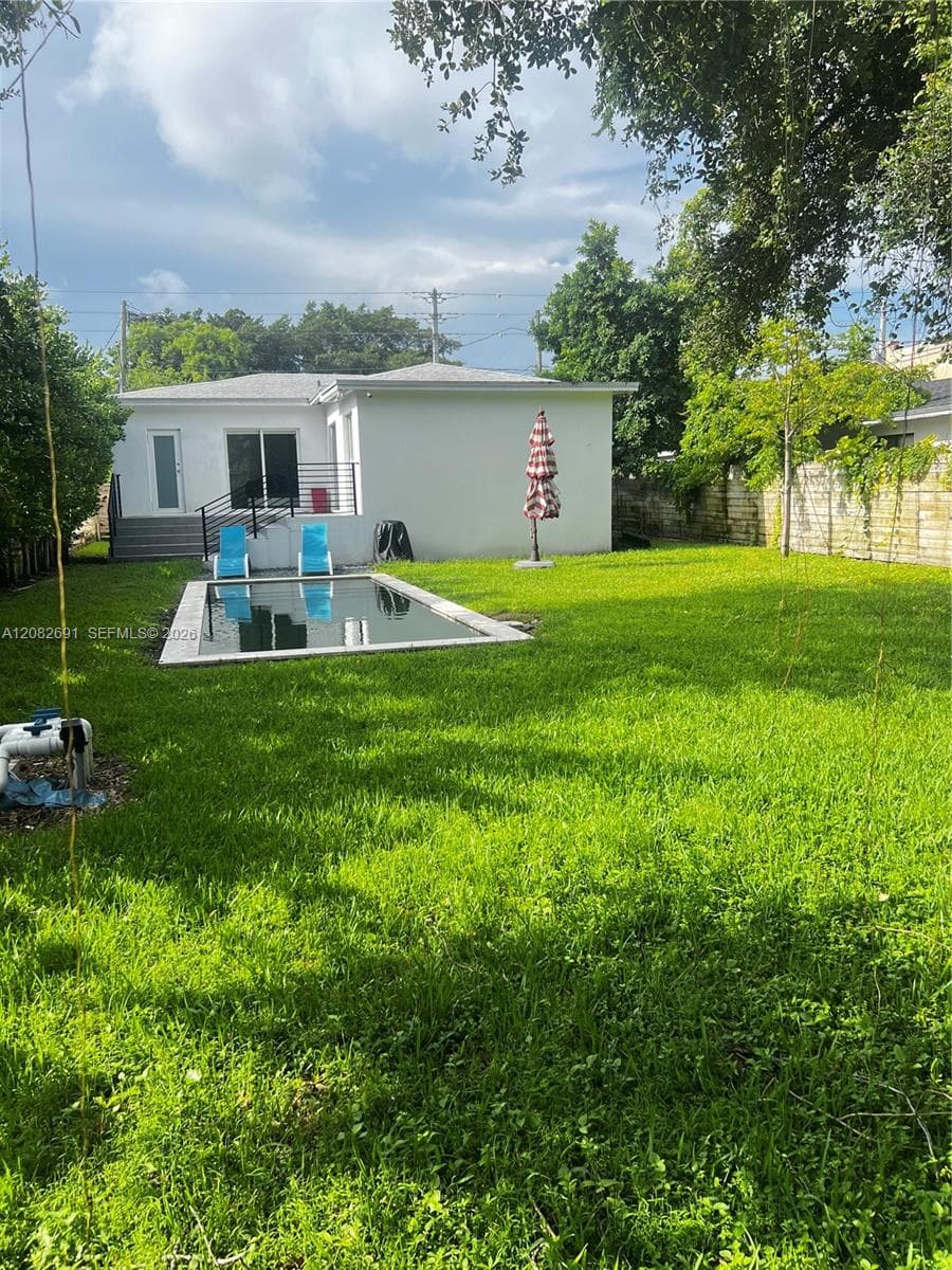 Single Family Residence at 15 NW 52nd St, Miami FL 33127