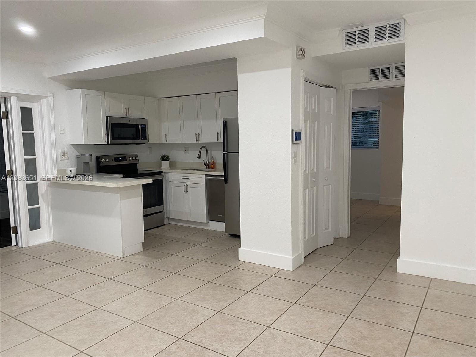 Condominium at 1 Edgewater Dr + DEN # 103, Coral Gables FL 33133