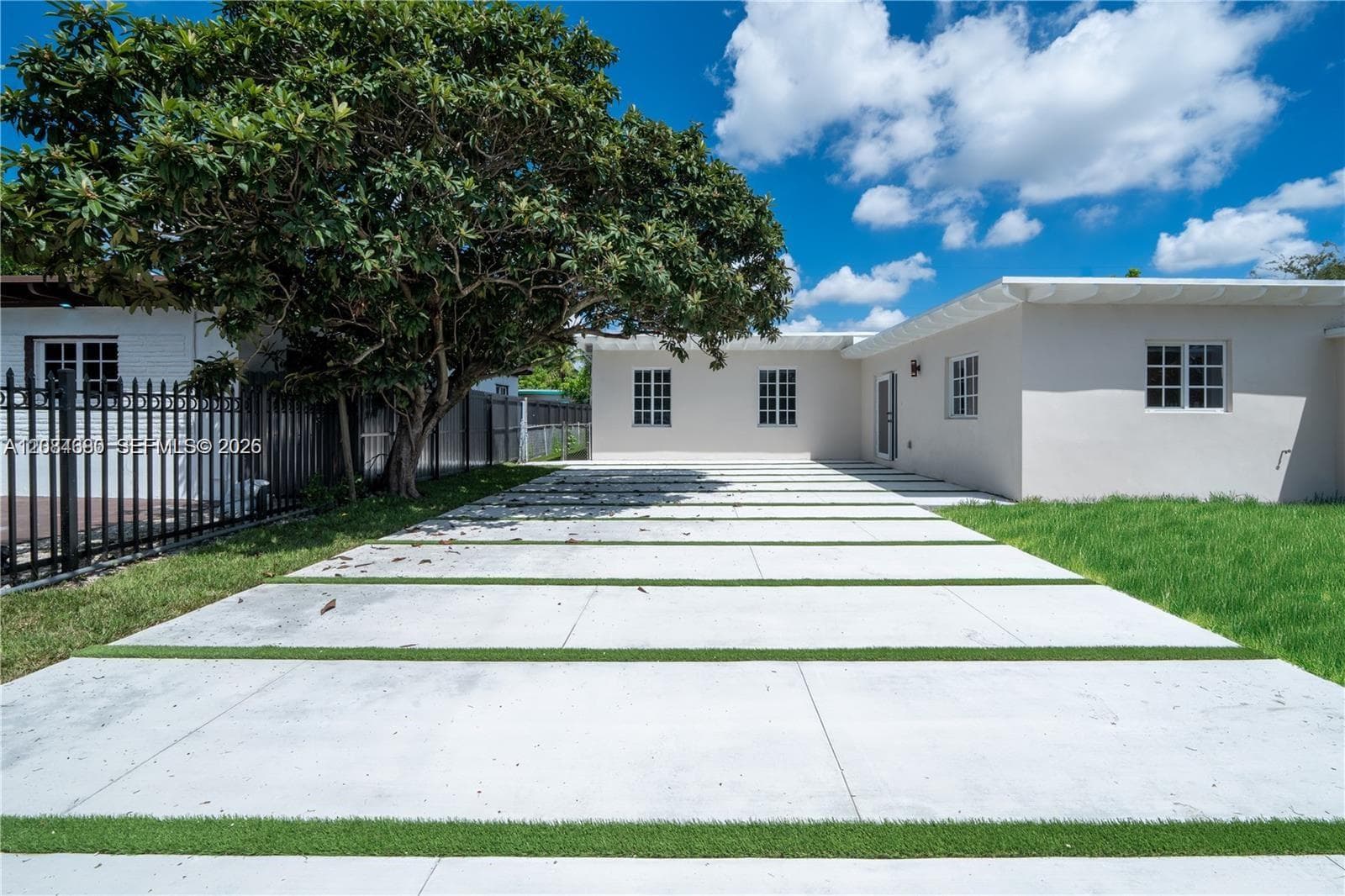 Single Family Residence at 323 NW 104th Ter, Miami FL 33150