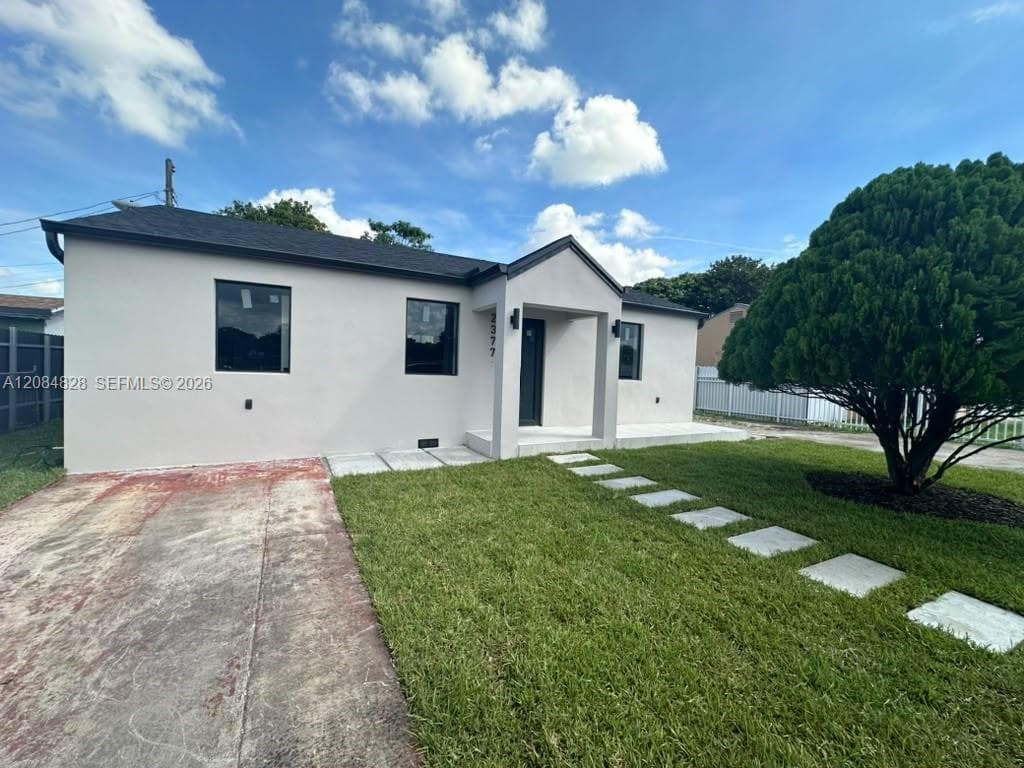 Single Family Residence at 2377 NW 84th St, Miami FL 33147