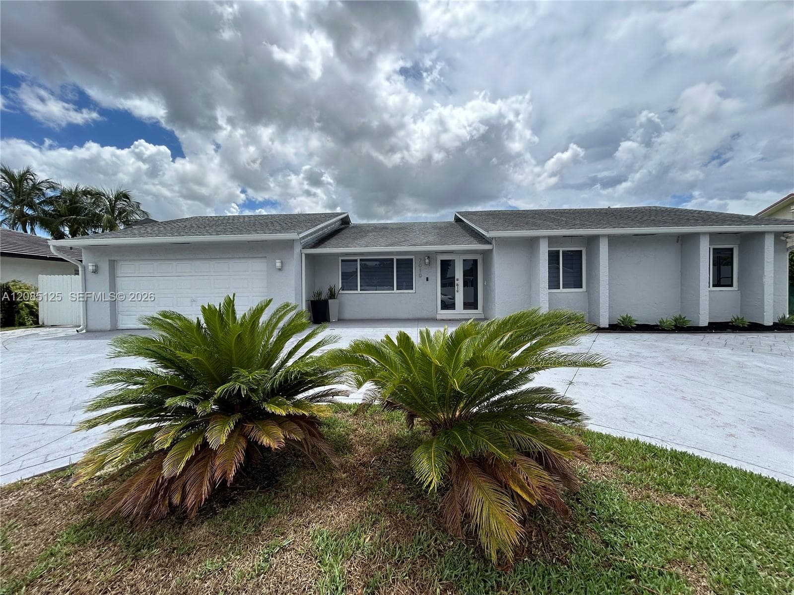 Single Family Residence at 7010 SW 144th Pl # 7010, Miami FL 33183