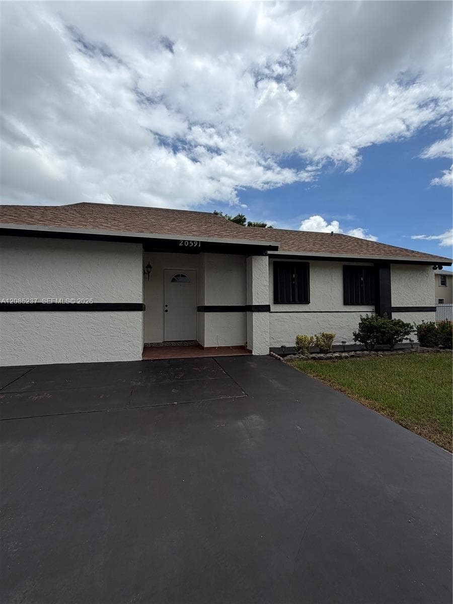 Single Family Residence at 20591 SW 124th Ct, Miami FL 33177