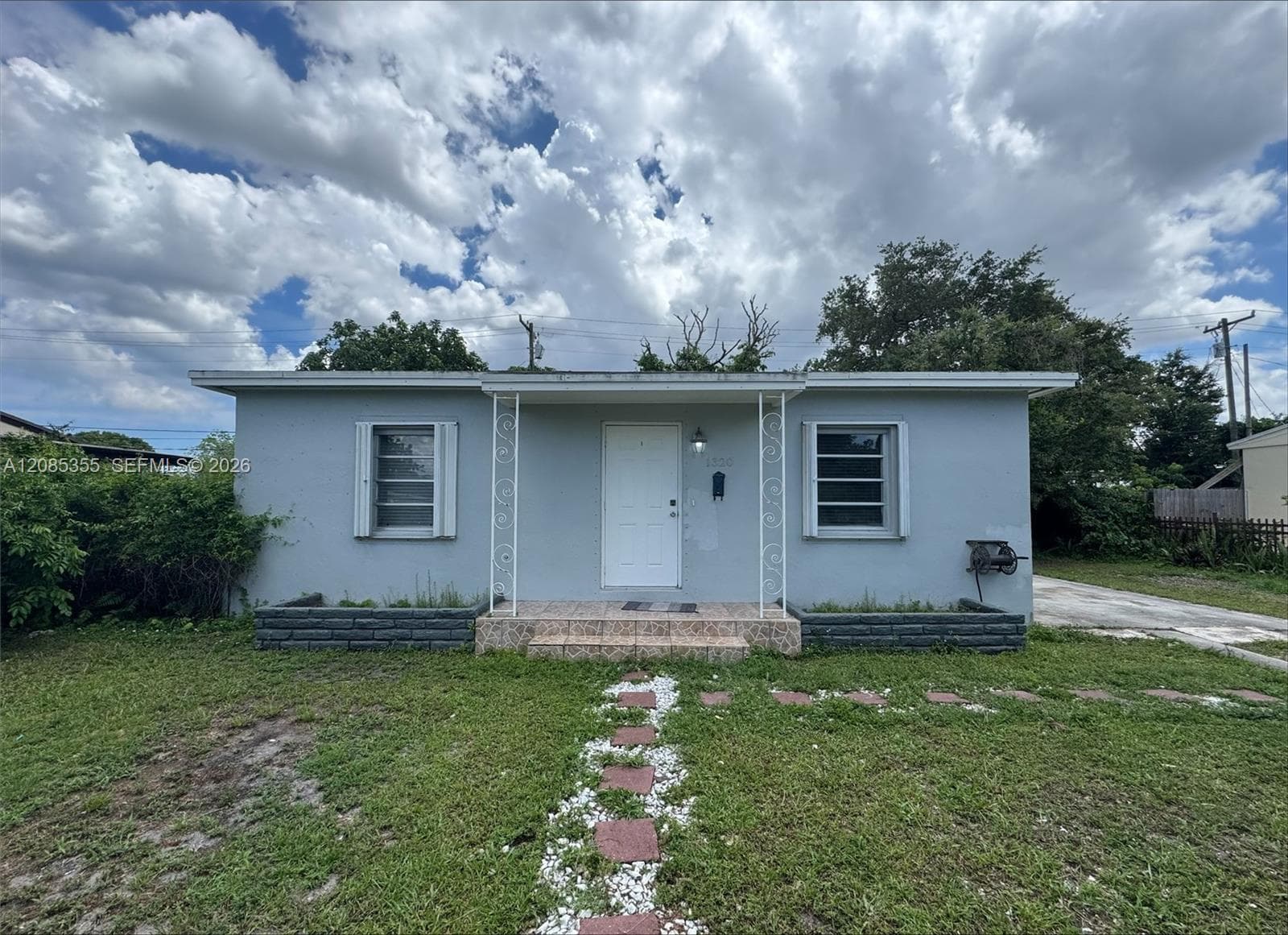 Single Family Residence at 1320 NW 87th St, Miami FL 33147
