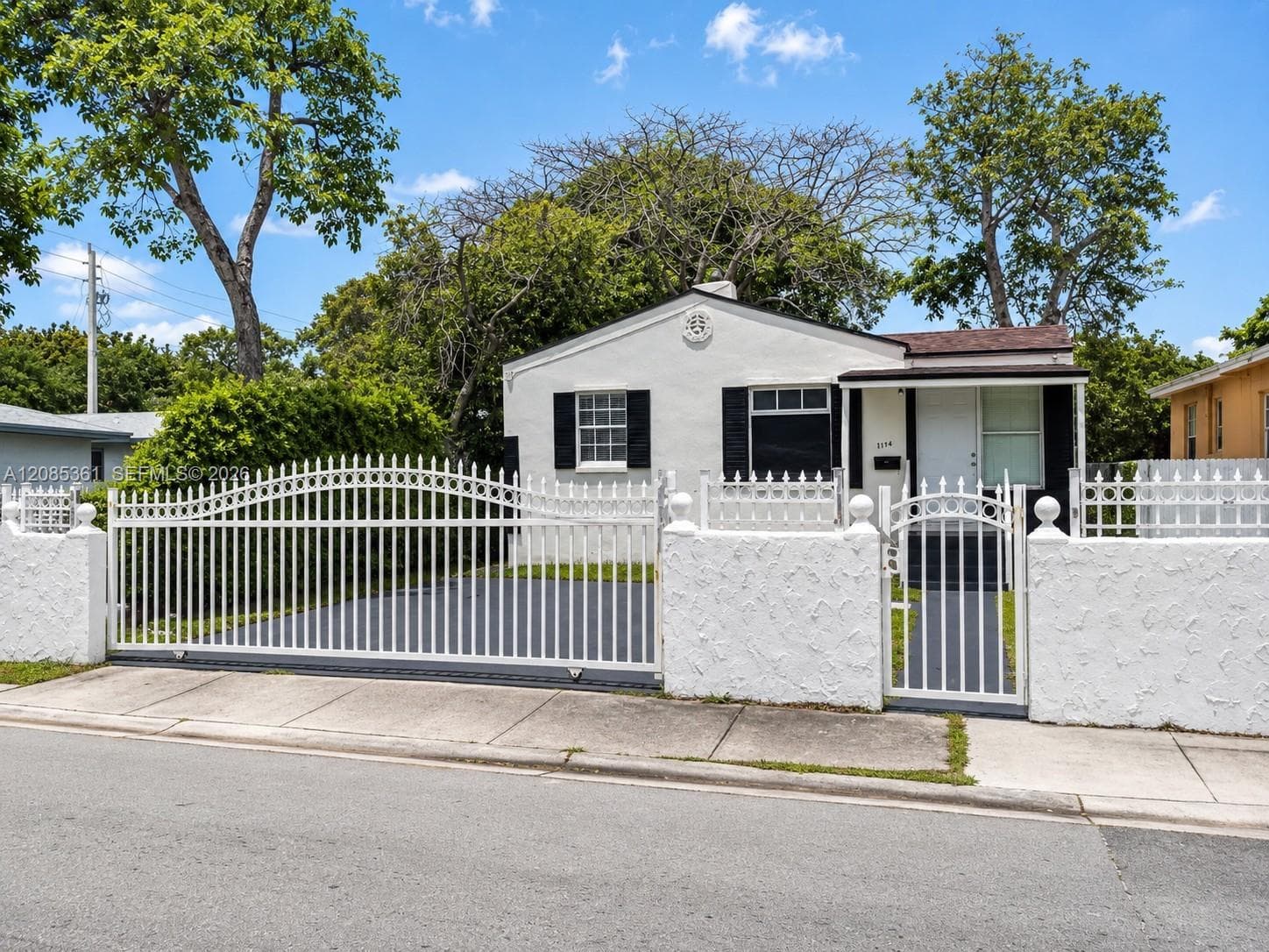 Single Family Residence at 1114 NW 59th St, Miami FL 33127