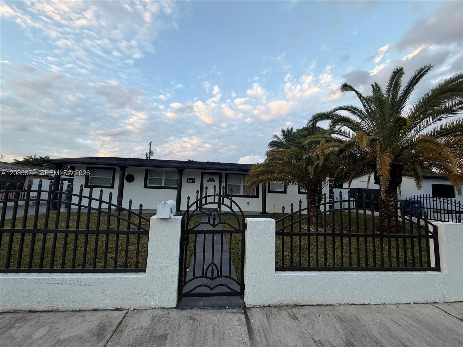 Single Family Residence at 1311 NW 176th Ter, Miami Gardens FL 33169