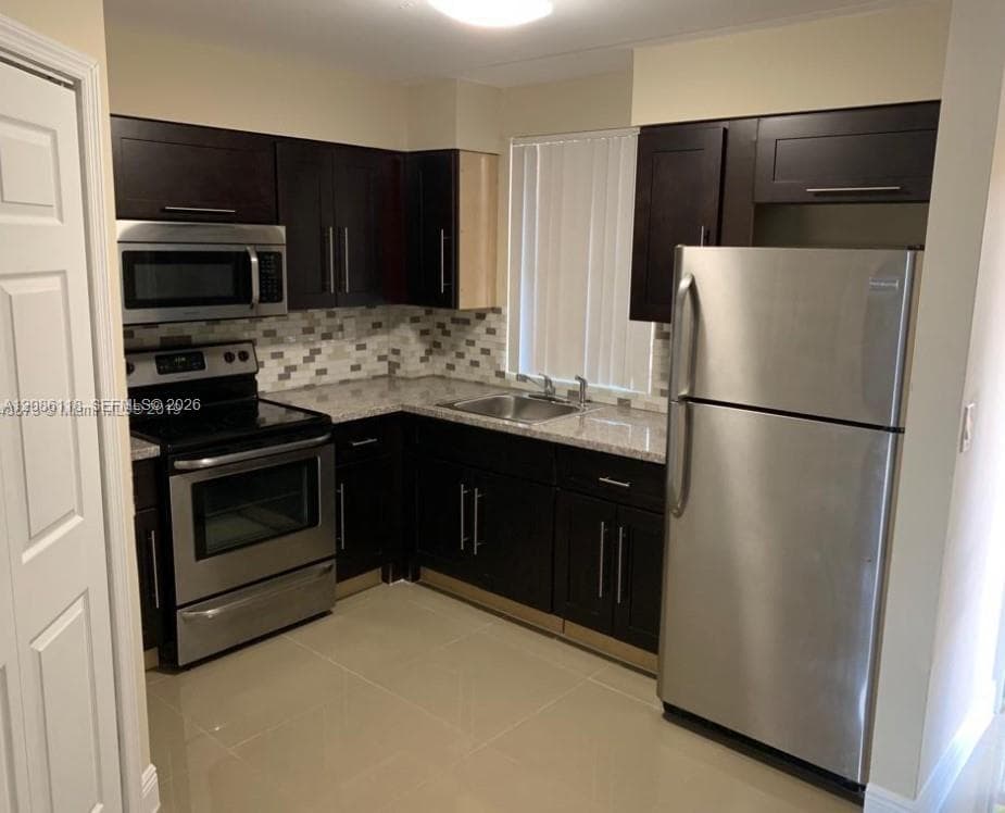 Condominium at 6175 NW 186th St # 305, Hialeah FL 33015