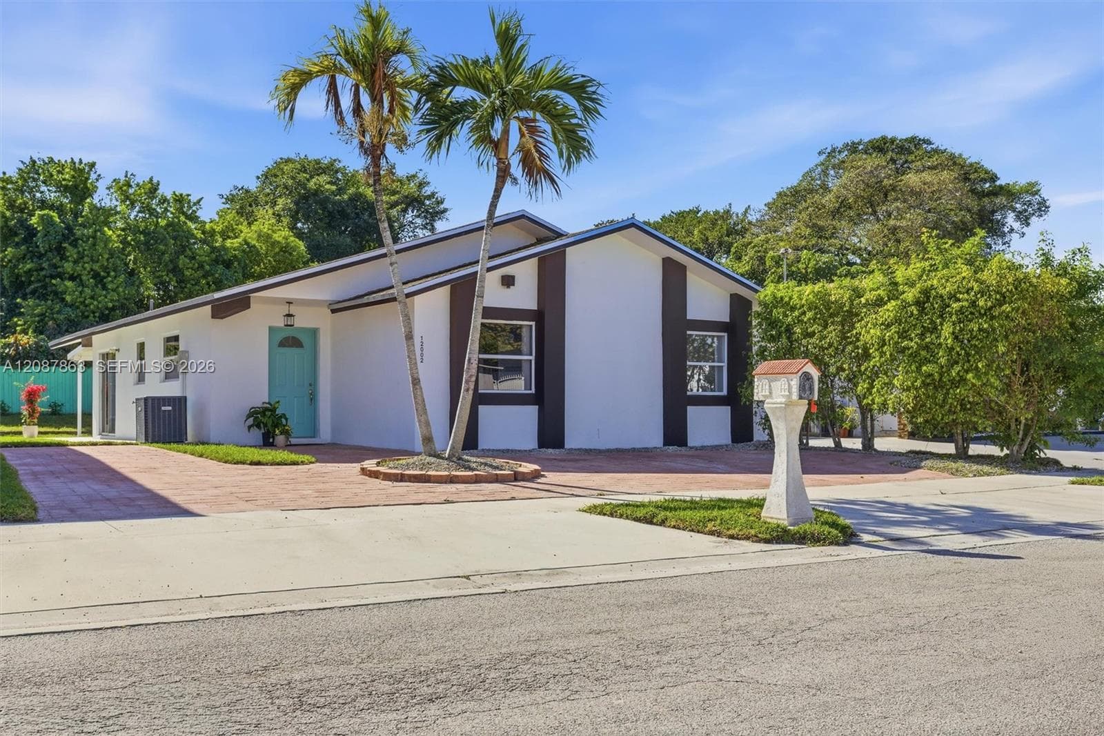 Single Family Residence at 12002 SW 210th St, Miami FL 33177