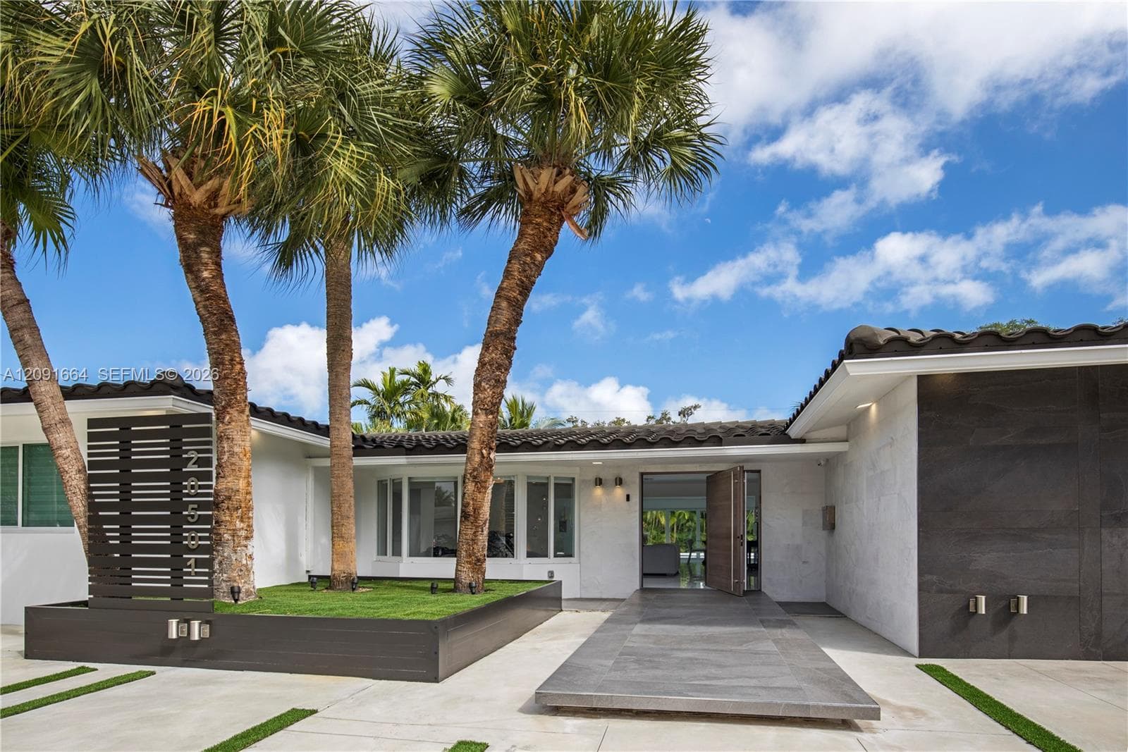Single Family Residence at 20501 NE 22nd Pl, Miami FL 33180
