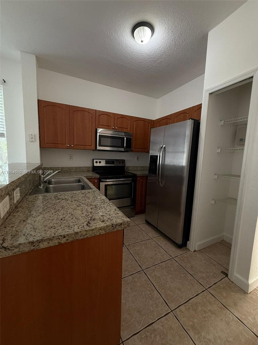 Condominium at 17640 NW 73rd Ave # 19, Hialeah FL 33015
